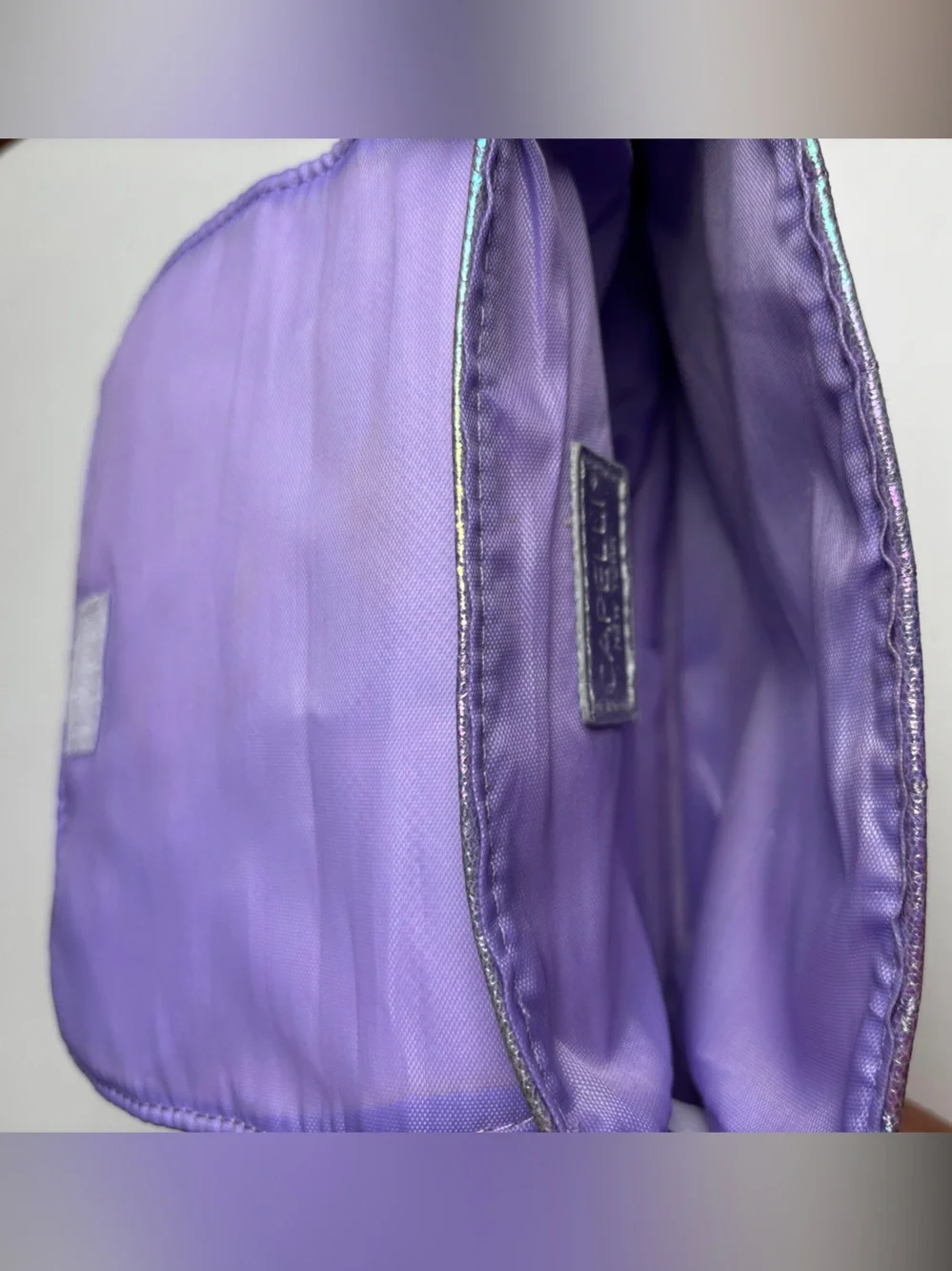 Capelli of New York Iridescent Purple Quilted Heart Crossbody